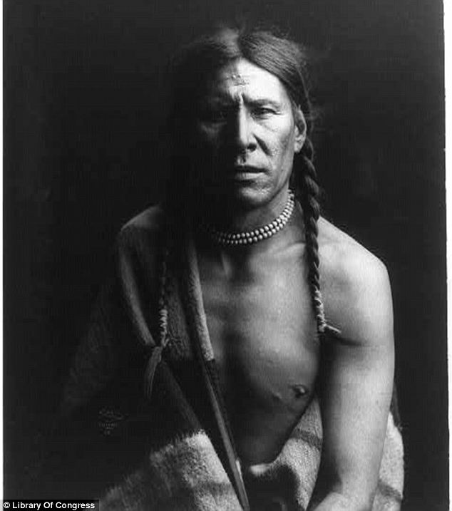 Basic: This photograph, taken around 1900, is titled simply 'Heavy Shield'